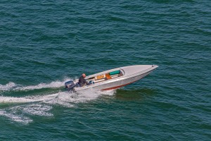 Man in Speed Boat
